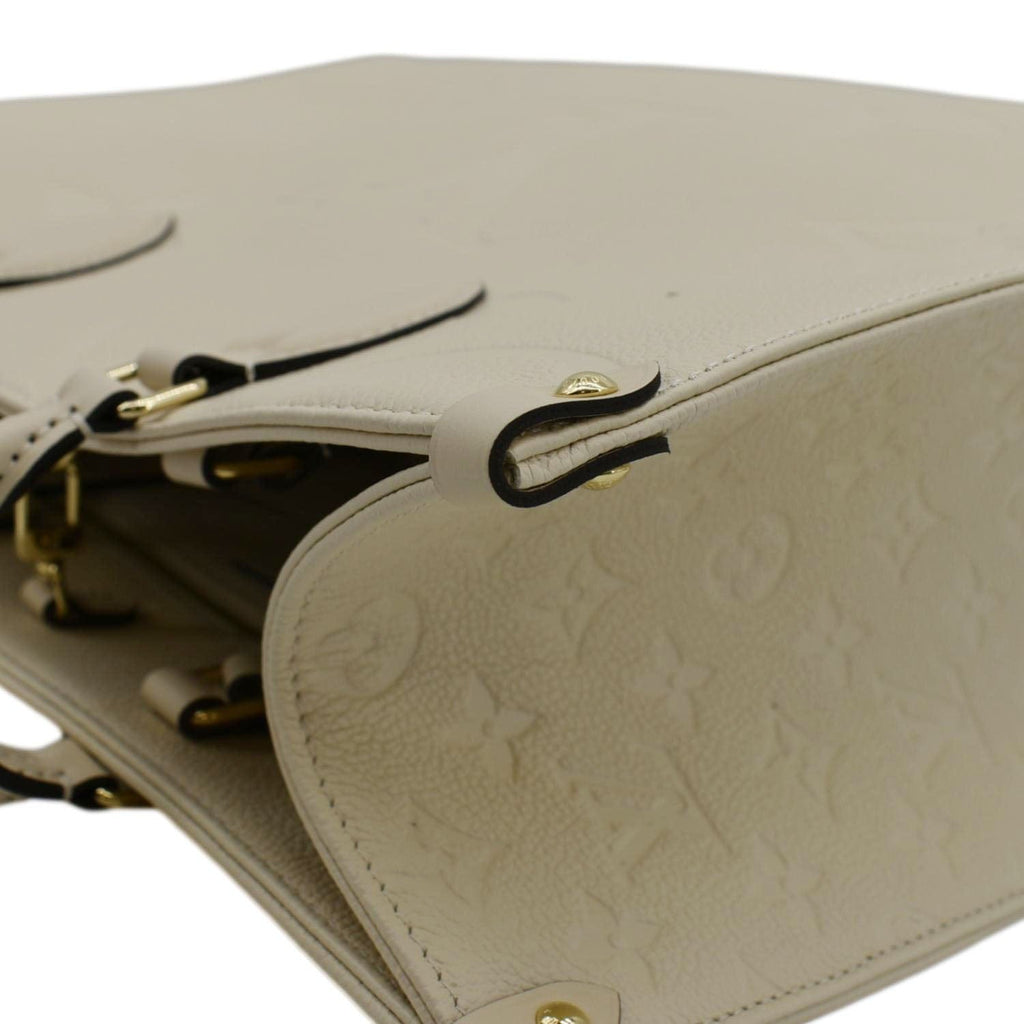 LOUIS VUITTON Onthego MM Monogram Empreinte Leather Tote Bag Cream