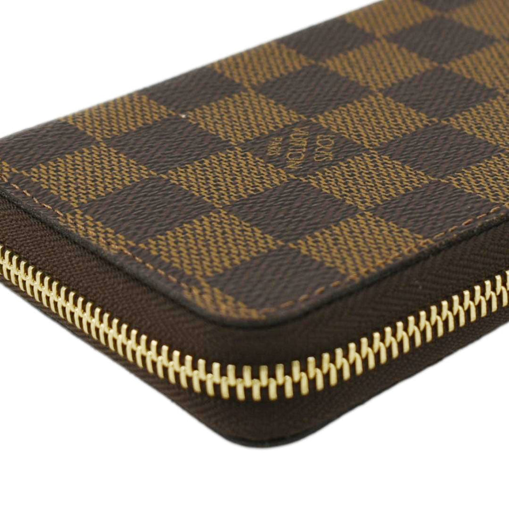LOUIS VUITTON Clemence Damier Ebene Zippy Wallet Brown