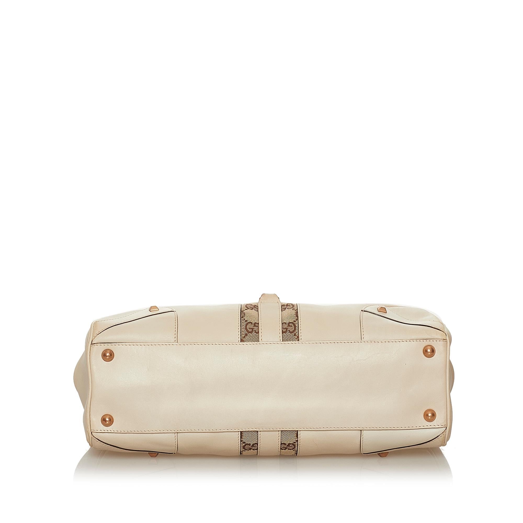 Gucci Gucci Canvas Nailhead Jackie Shoulder Bag (SHG-28382)