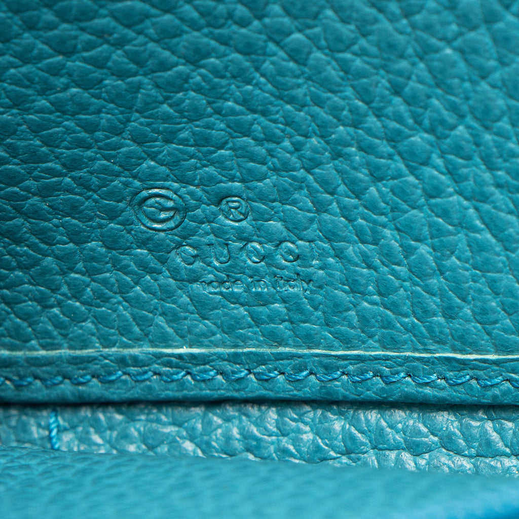 Gucci GG Canvas Zip Around Wallet