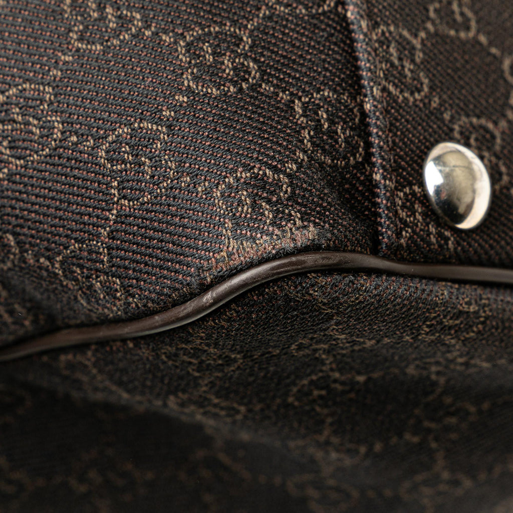 Gucci GG Denim Travel Bag (SHG-DNQbci)