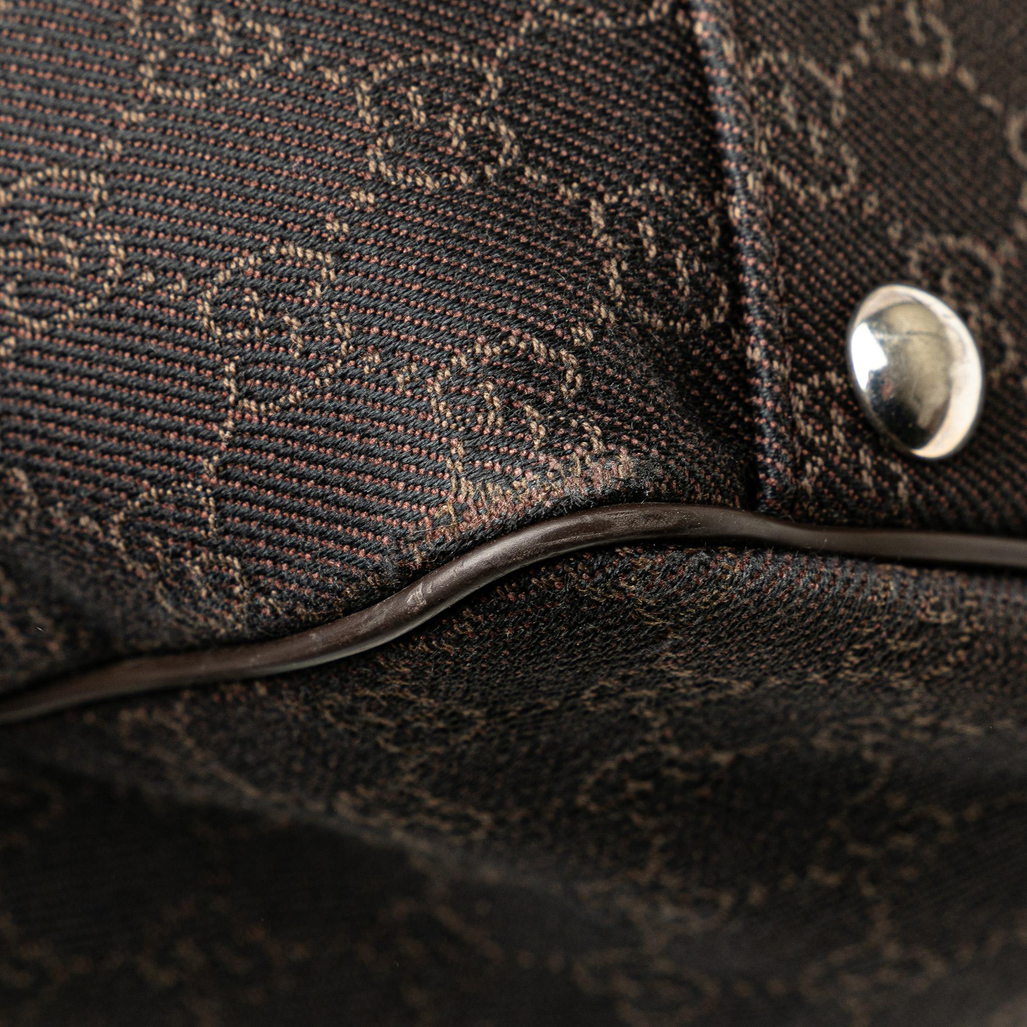Gucci GG Denim Travel Bag (SHG-DNQbci)