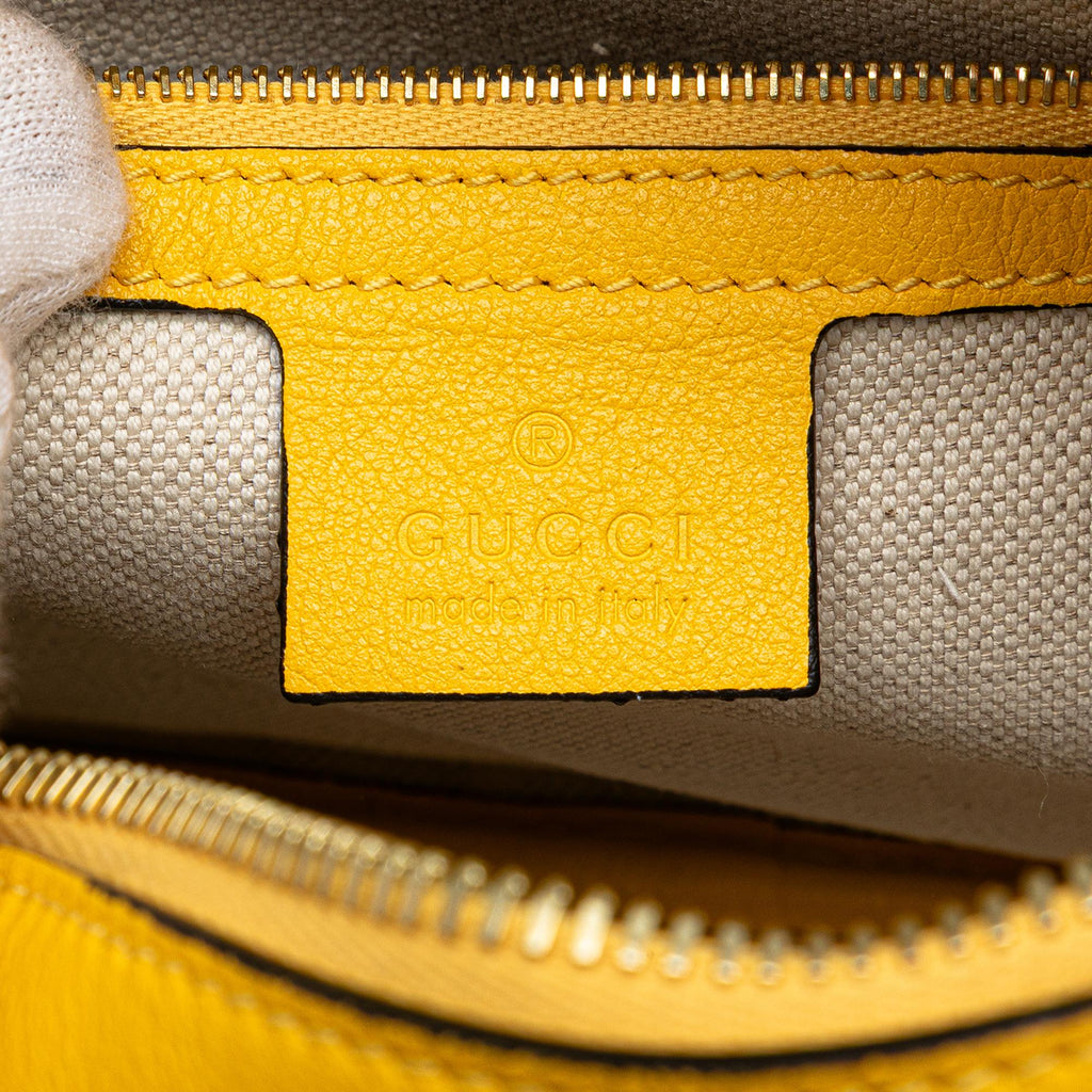 Gucci GG Star Embossed Leather Crossbody