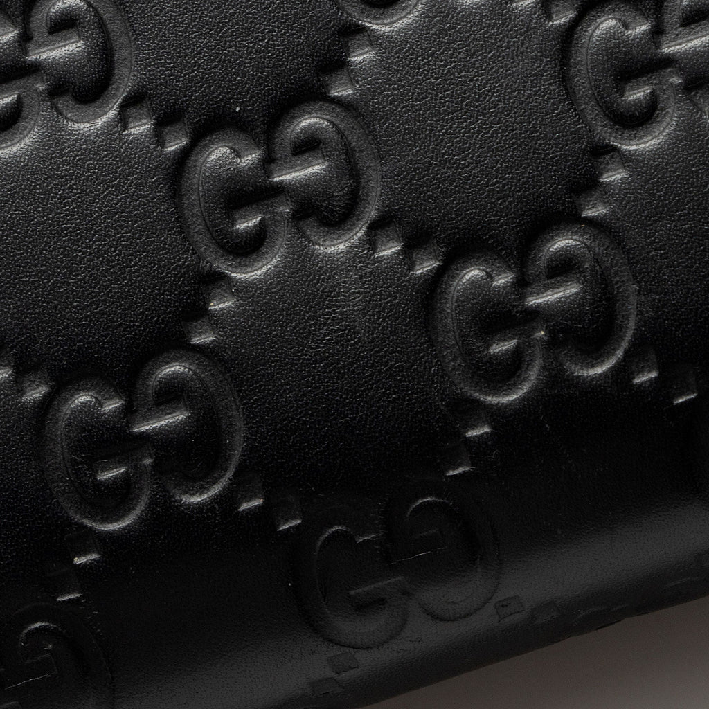 Gucci Guccissima Leather Bow Zip Around Wallet