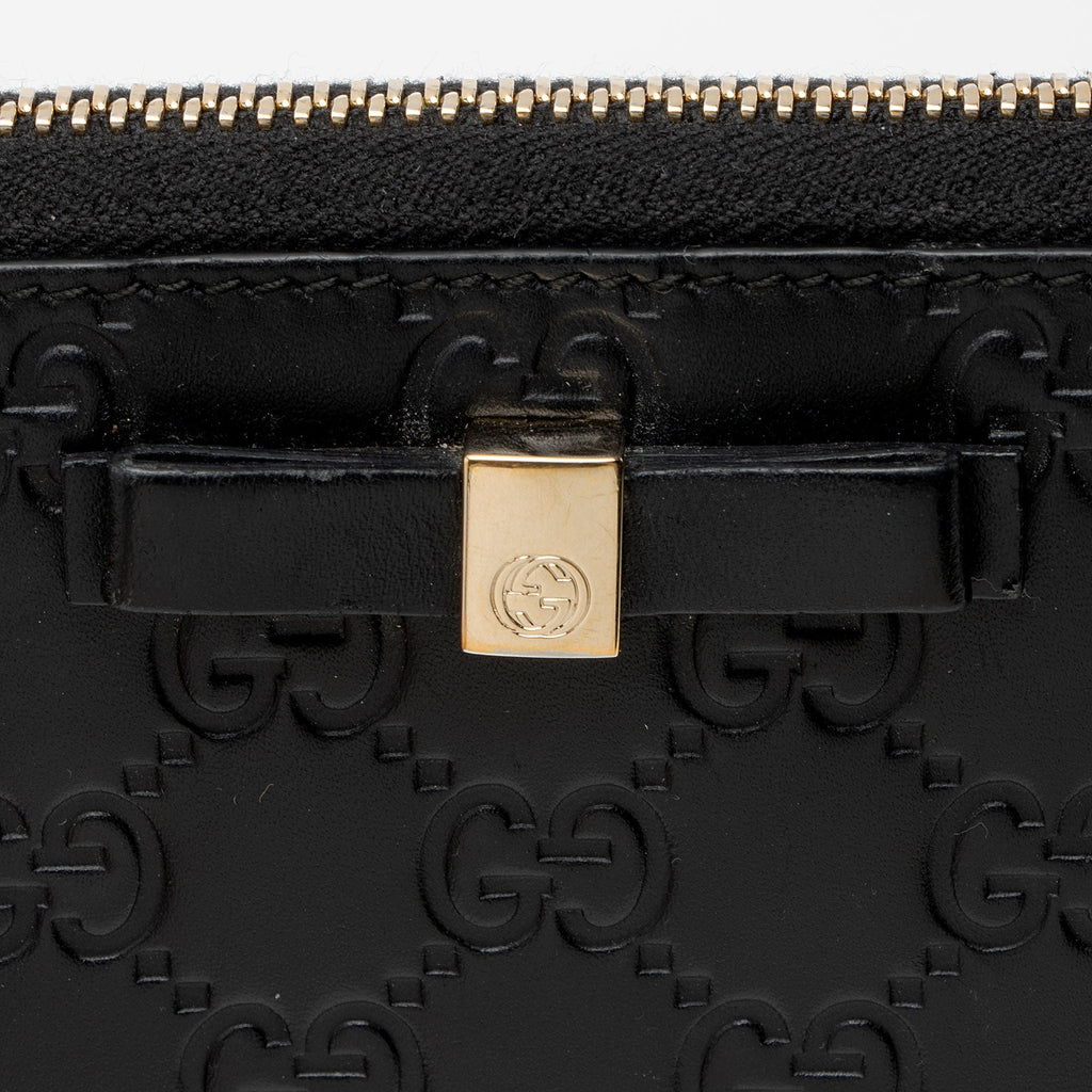 Gucci Guccissima Leather Bow Zip Around Wallet