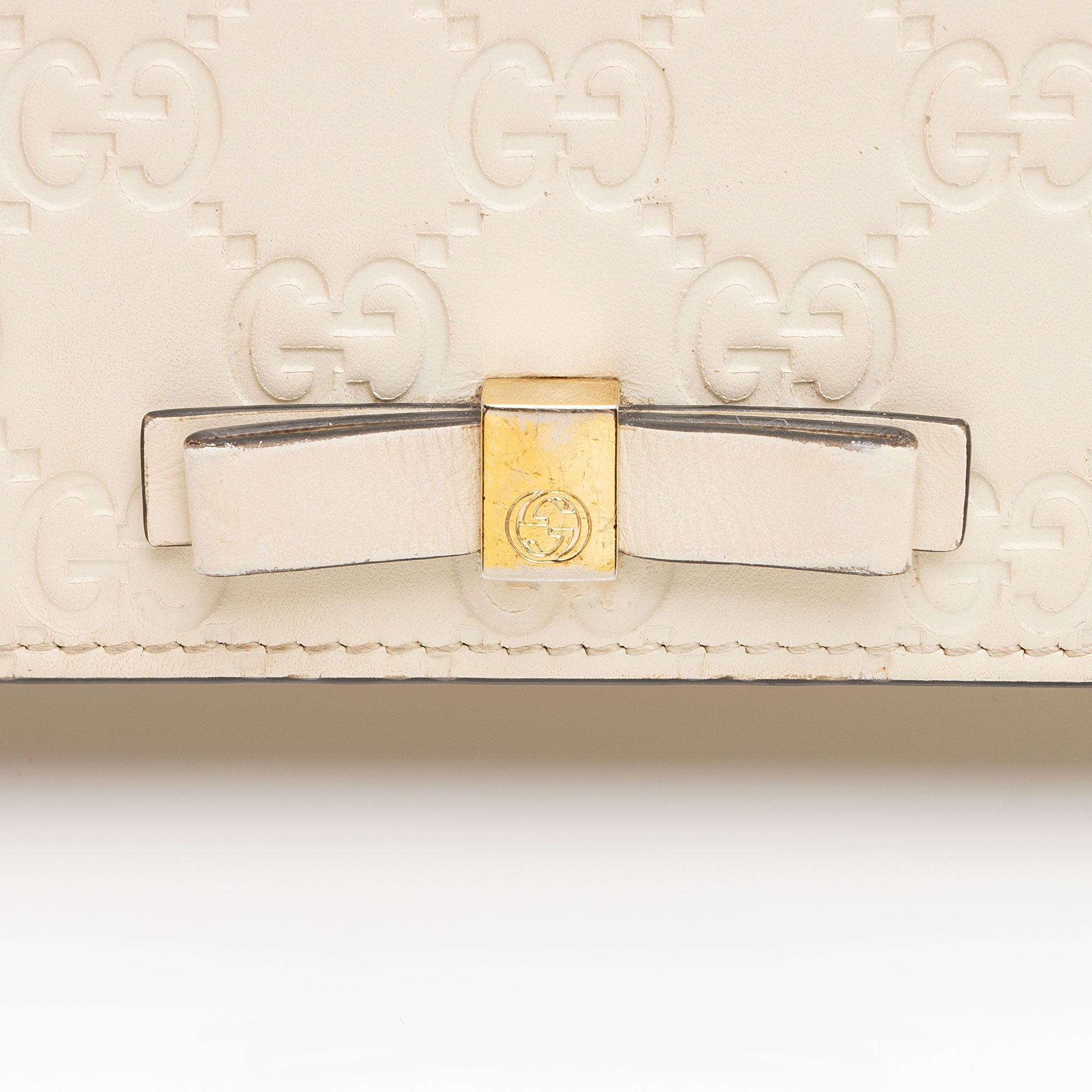 Gucci Guccissima Leather Signature Bow Mini Wallet on Chain