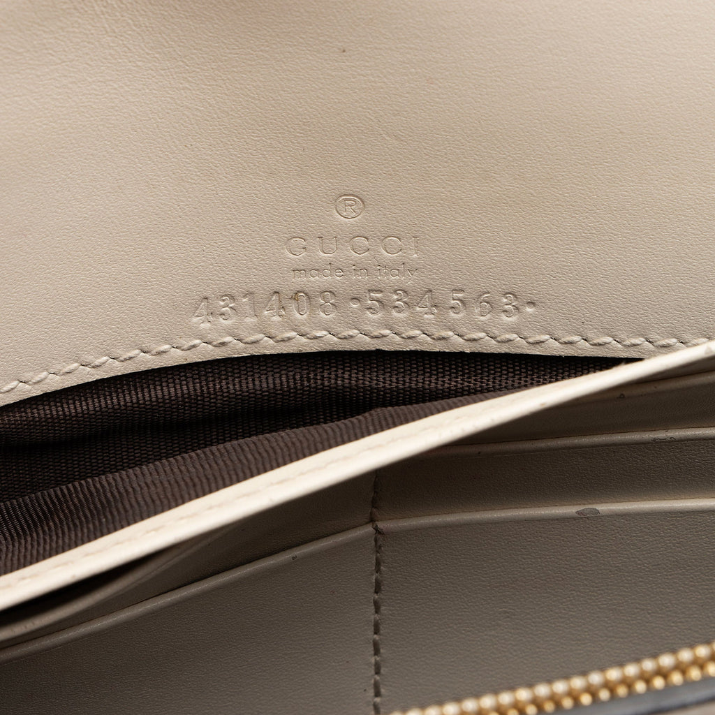 Gucci Guccissima Leather Signature Bow Mini Wallet on Chain