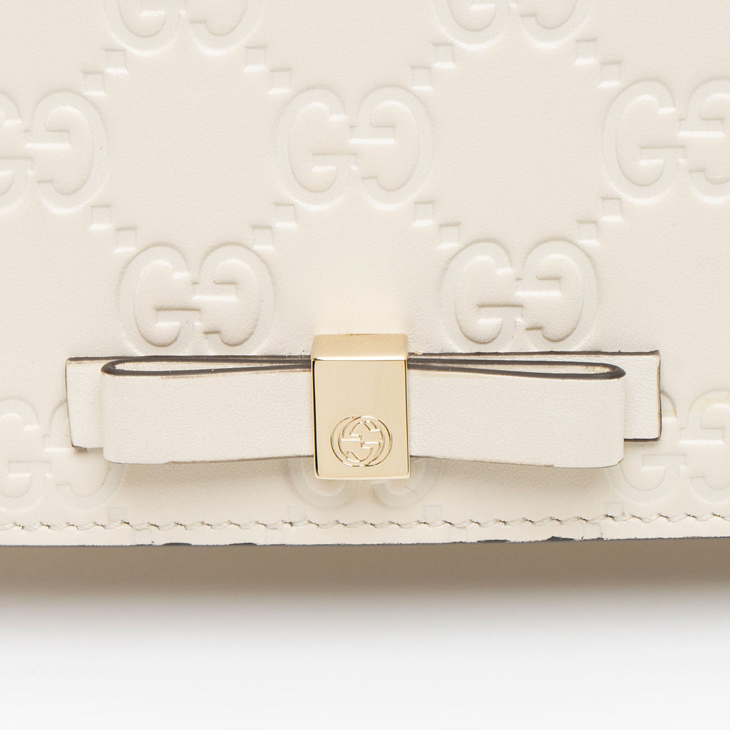 Gucci Guccissima Leather Signature Bow Mini Wallet on Chain