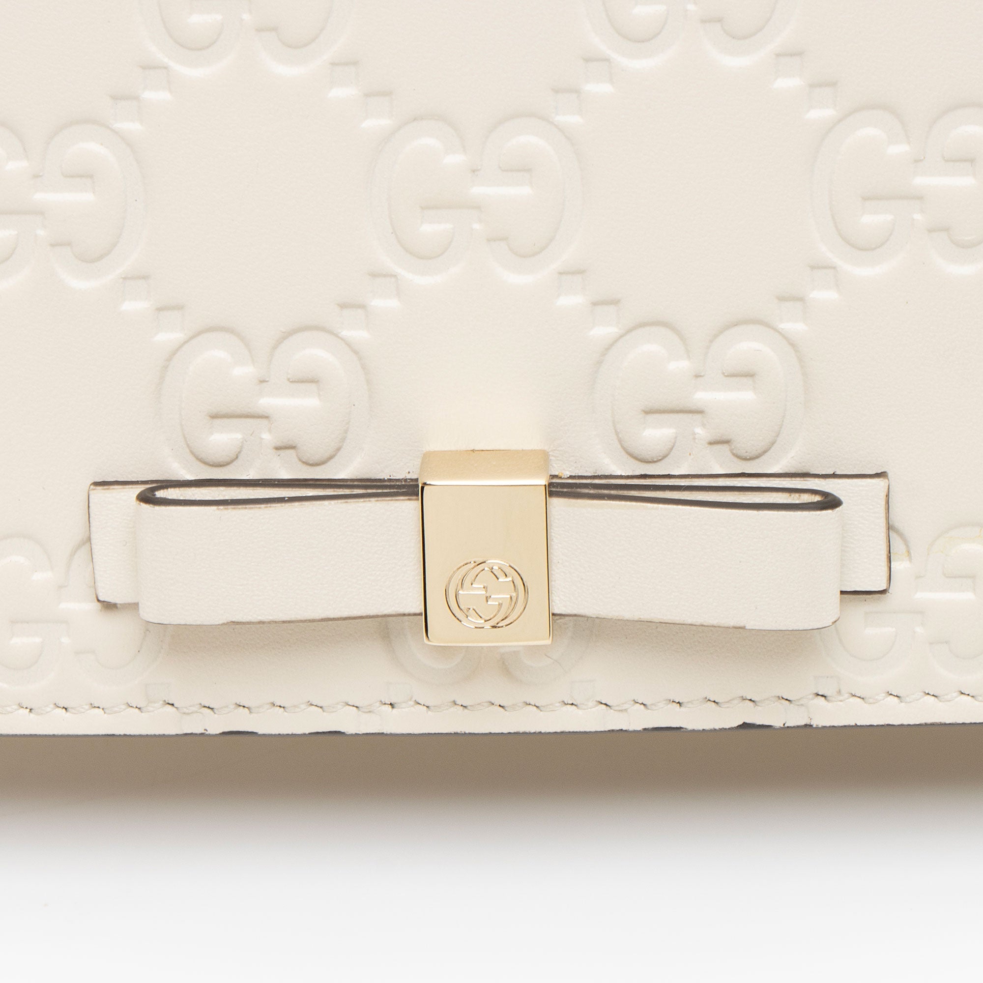 Gucci Guccissima Leather Signature Bow Mini Wallet on Chain