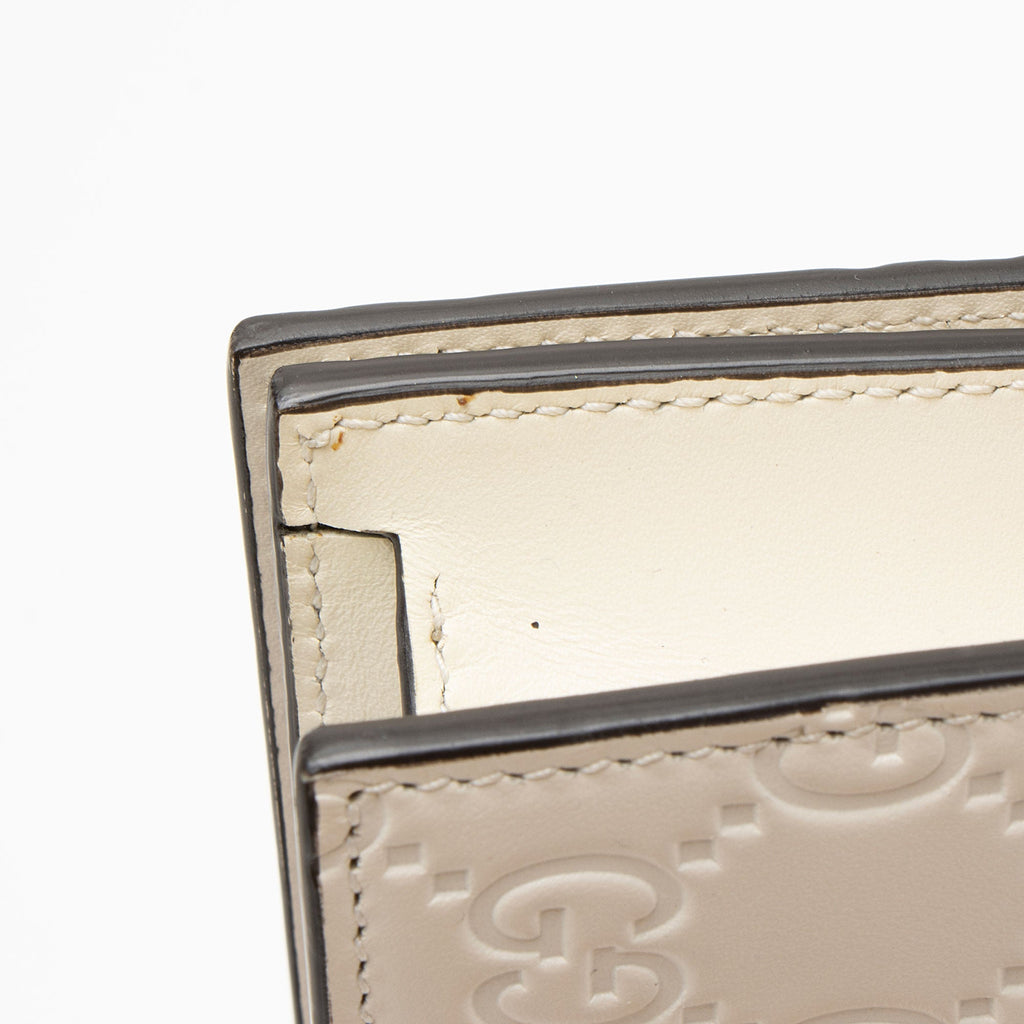 Gucci Guccissima Leather Signature Bow Mini Wallet on Chain