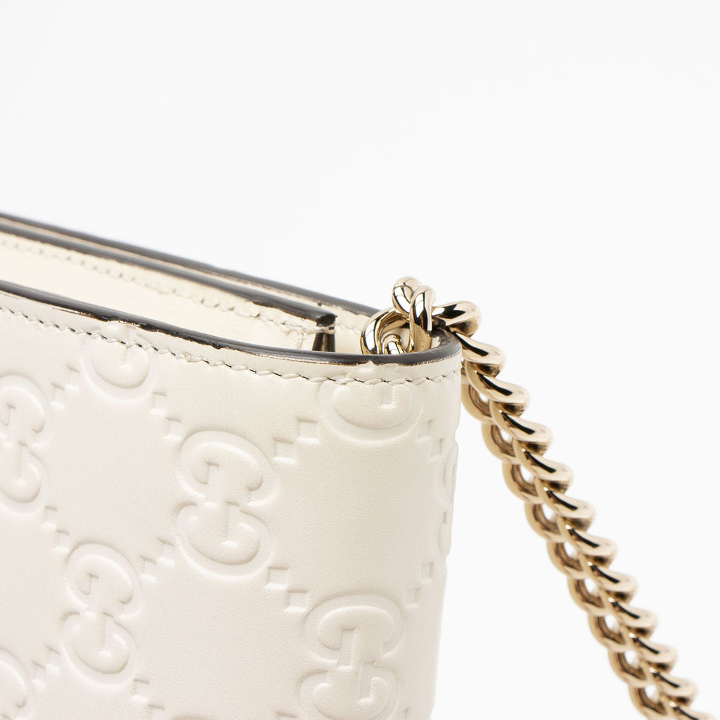 Gucci Guccissima Leather Signature Bow Mini Wallet on Chain