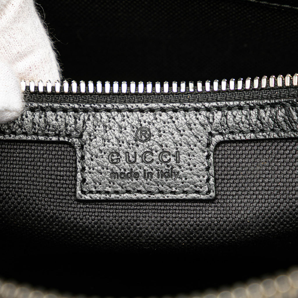 Gucci Jumbo GG Canvas Clutch on Strap