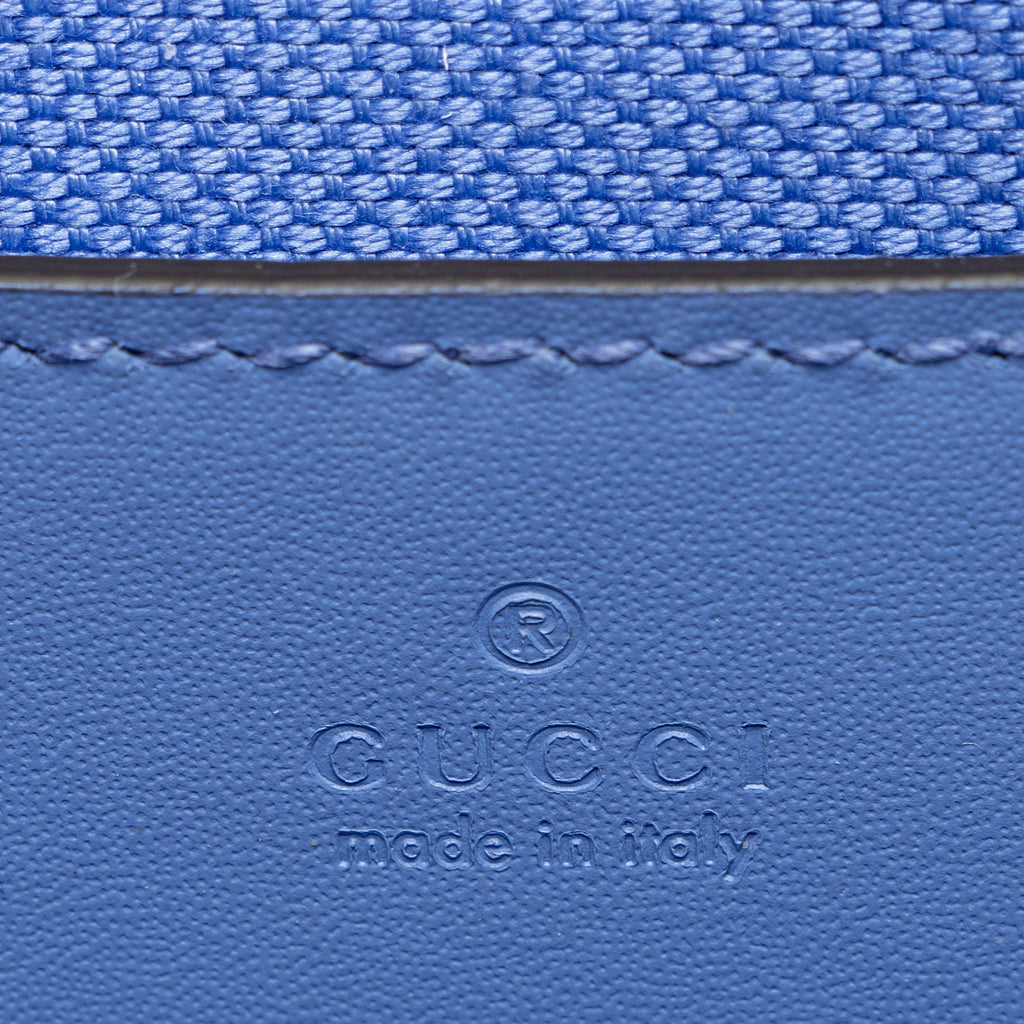 Gucci Jumbo GG Leather Mini Pochette