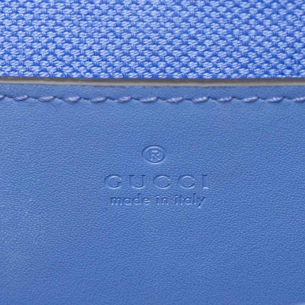 Gucci Jumbo GG Leather Mini Pochette