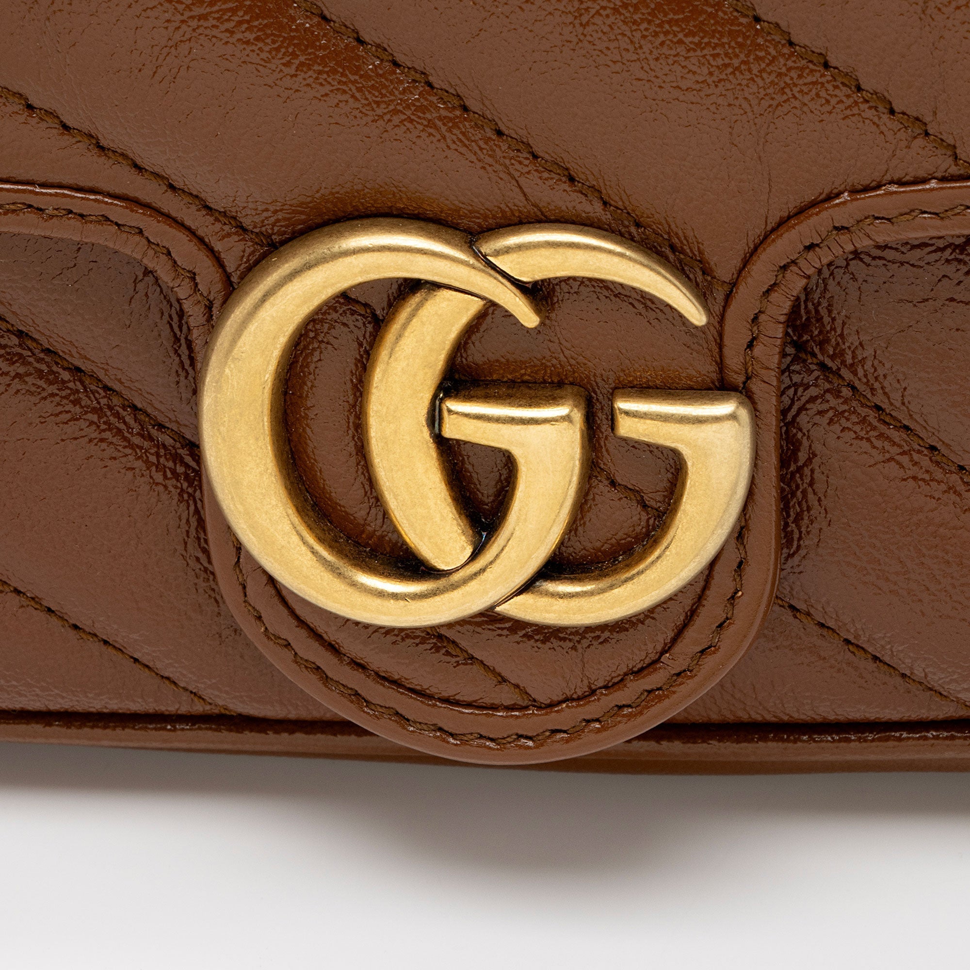 Gucci Matelasse Leather GG Marmont Super Mini Flap Bag (SHF-OIMhbP)