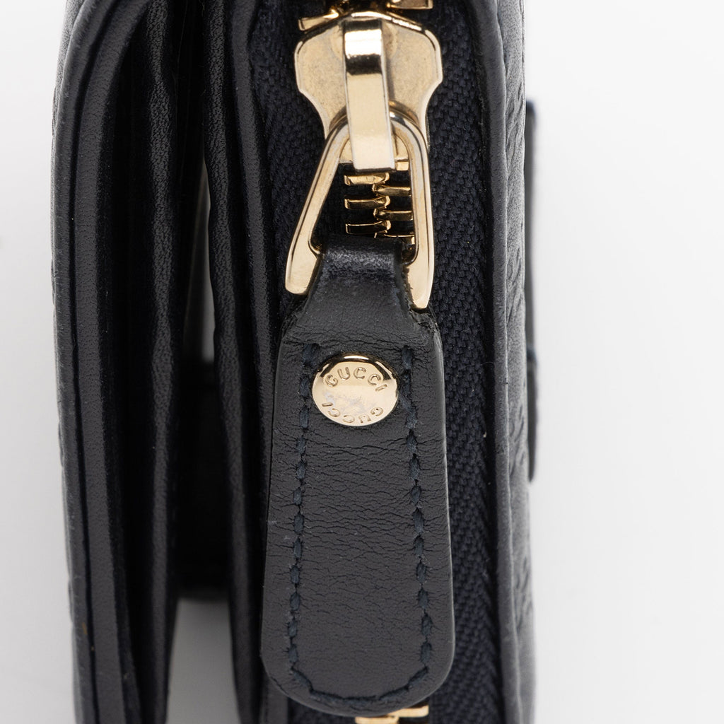 Gucci Microguccissima Leather Compact Zip Around Wallet (SHF-0RgGLi)
