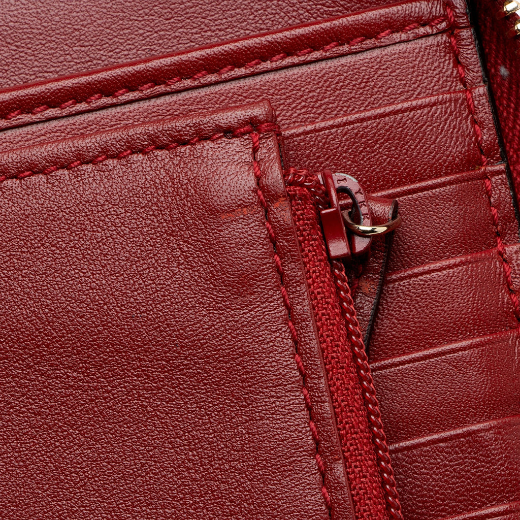 Gucci Microguccissima Leather Zip Around Compact Wallet
