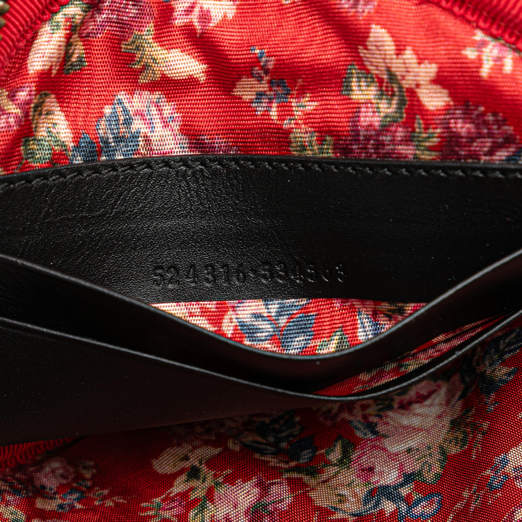 Gucci PatLBt and Rubber Game Patch Logo Wristlet Bag