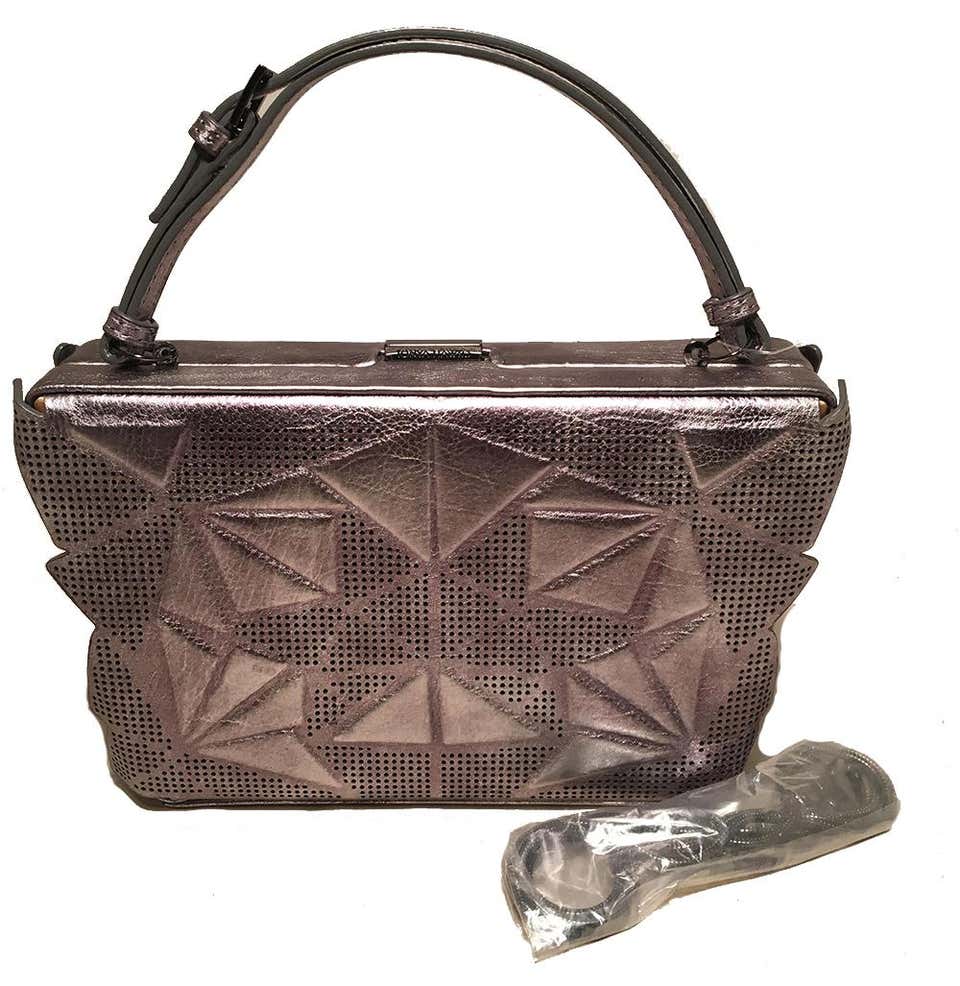 Tonya Hawkes SiLouis Vuittoner Metallic Embossed and Laser Cut Leather Convertible Clutch