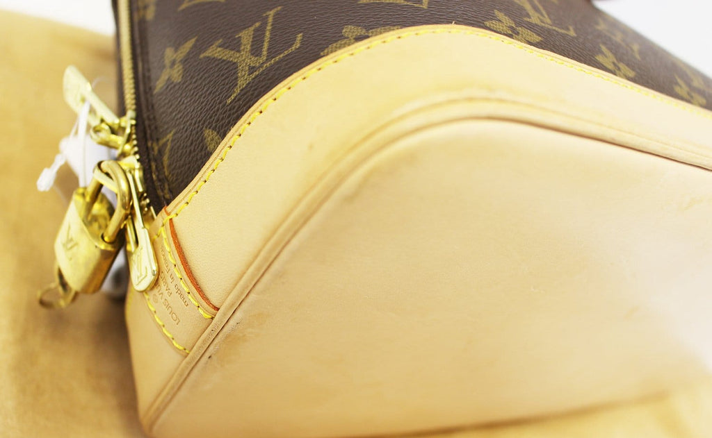 LOUIS VUITTON Monogram Canvas Alma Brown Handbag - 30% Off