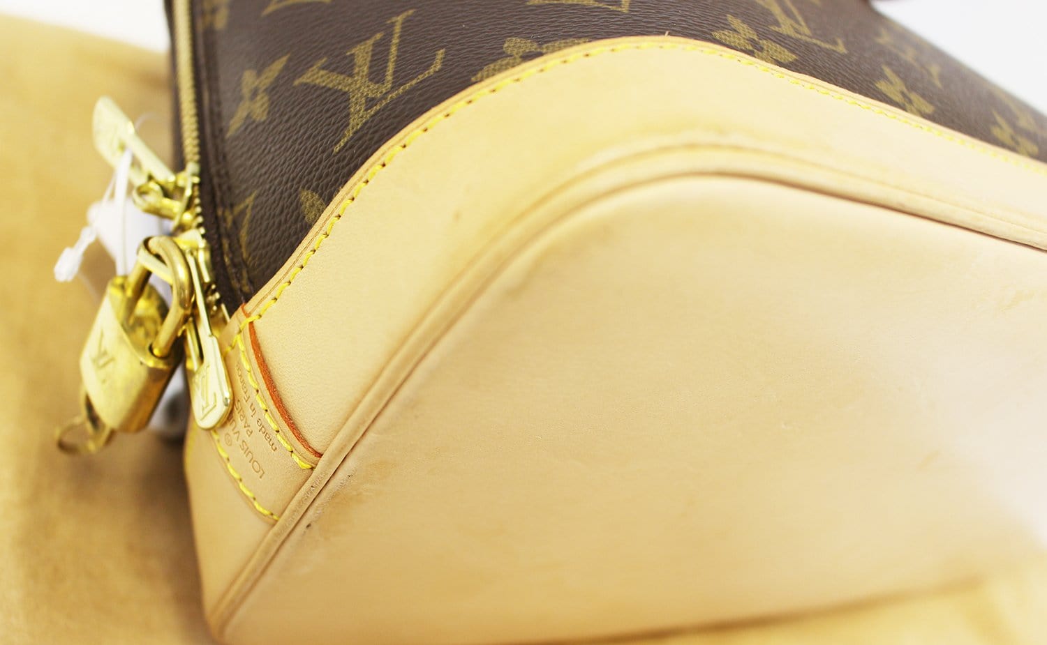 LOUIS VUITTON Monogram Canvas Alma Brown Handbag - 30% Off