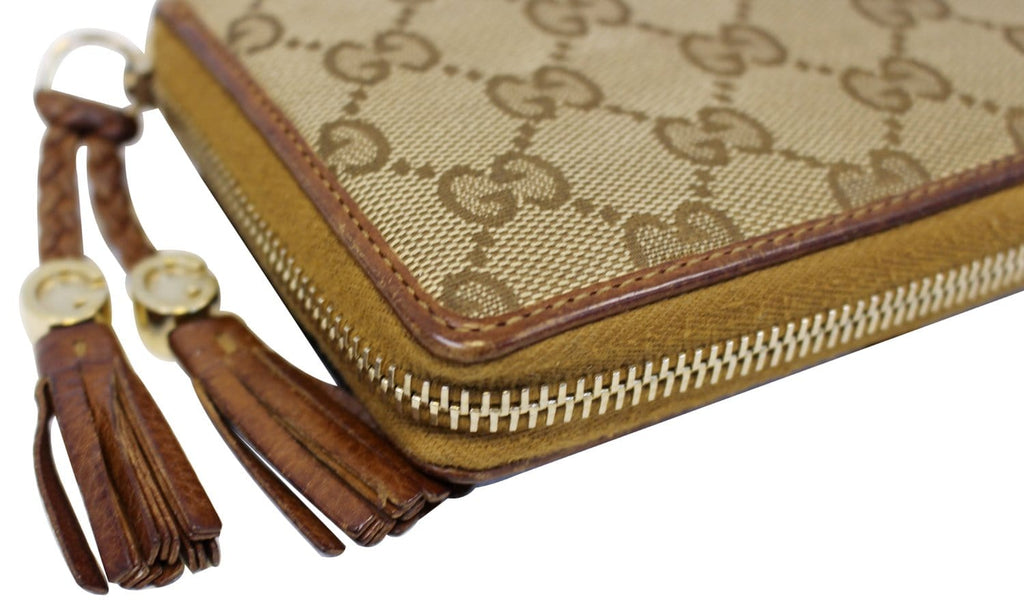 GUCCI Gucci Canvas Zip Around with Tassels Wallet 261393
