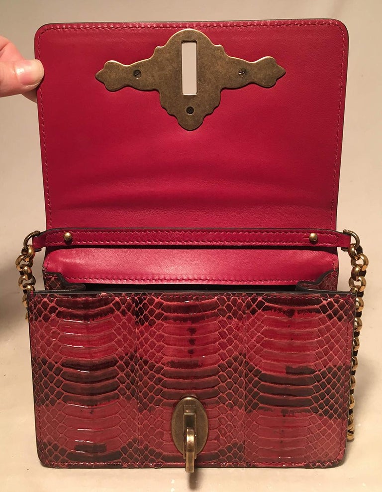 Dolce and GaBurberryana Maroon Snakeskin Keyhole Clutch Bag