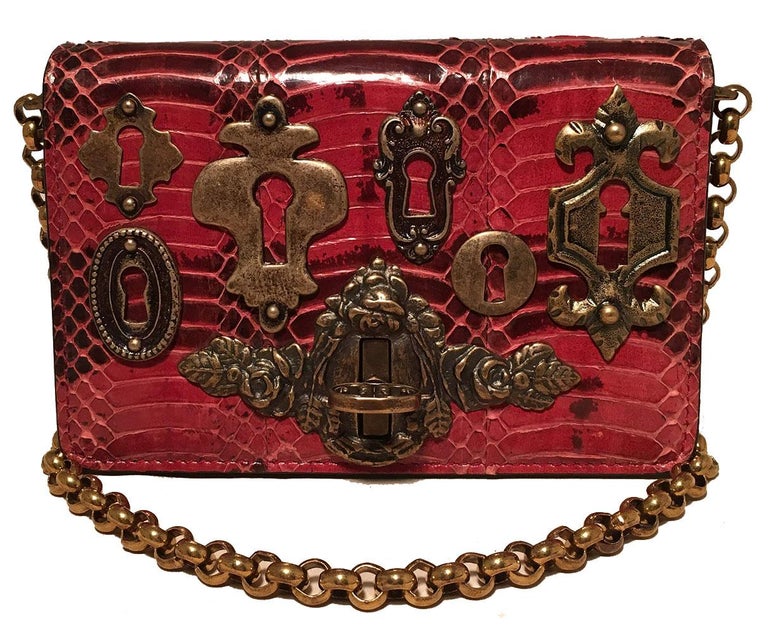 Dolce and GaBurberryana Maroon Snakeskin Keyhole Clutch Bag
