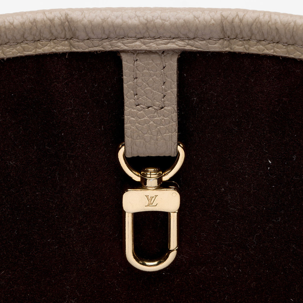 Louis Vuitton Giant Monogram Empreinte Neverfull MM Tote