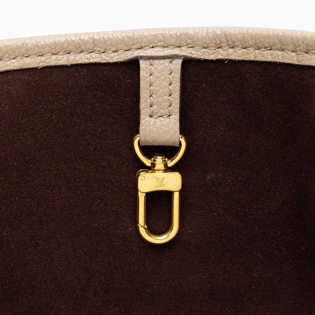 Louis Vuitton Giant Monogram Empreinte Neverfull MM Tote