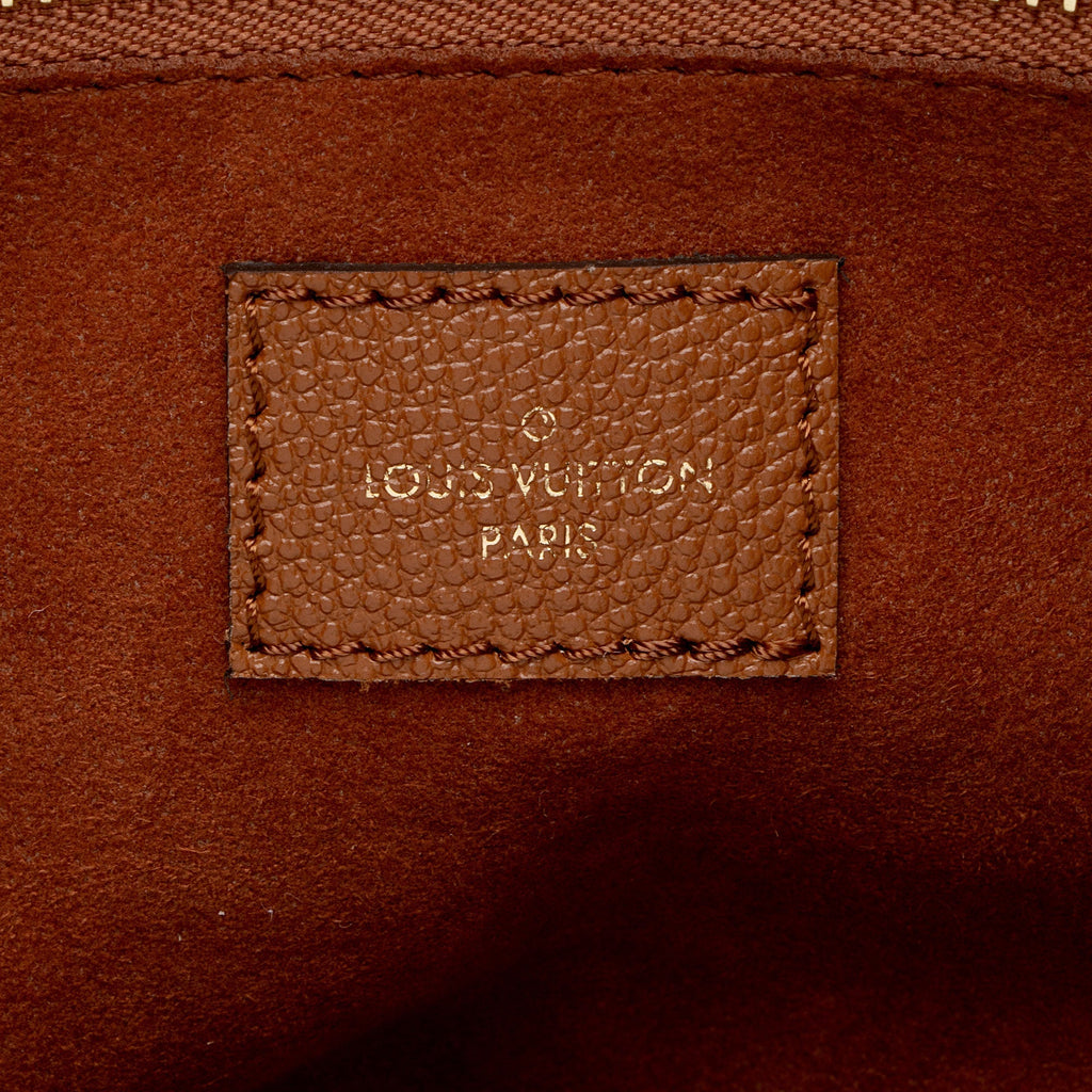Louis Vuitton Giant Monogram Empreinte Neverfull MM Tote