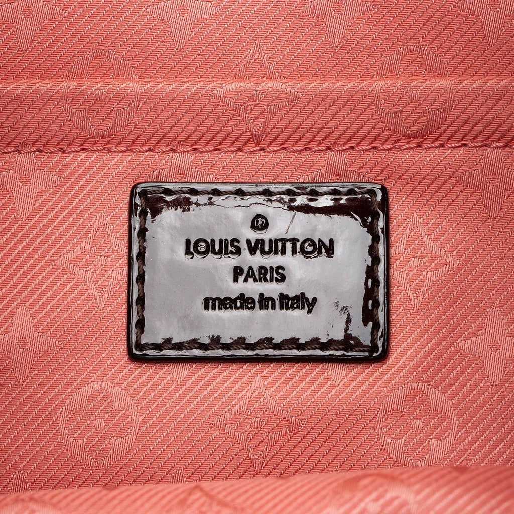 Louis Vuitton Leather Monogram Altair Clutch (SHF-Iyz0F8)