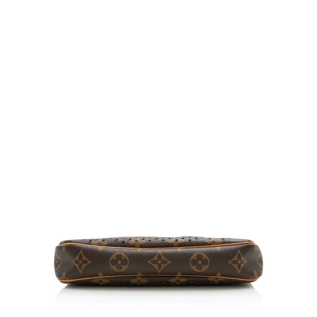 Louis Vuitton Limited Edition Monogram Canvas Perforated Pochette (SHF-22741)