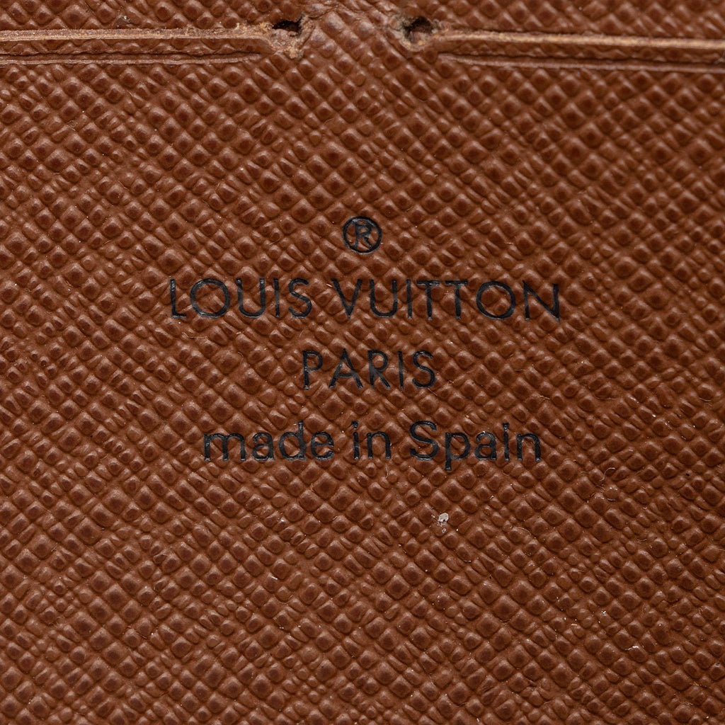 Louis Vuitton Limited Edition Monogram Canvas Roses Zippy Wallet (SHF-JmfQTk)