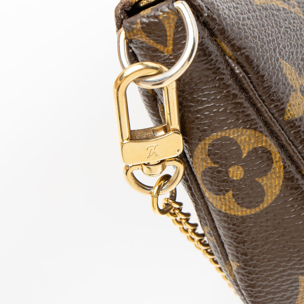 Louis Vuitton Limited Edition Monogram Canvas Trunks & Bags Mini Pochette Accessoires