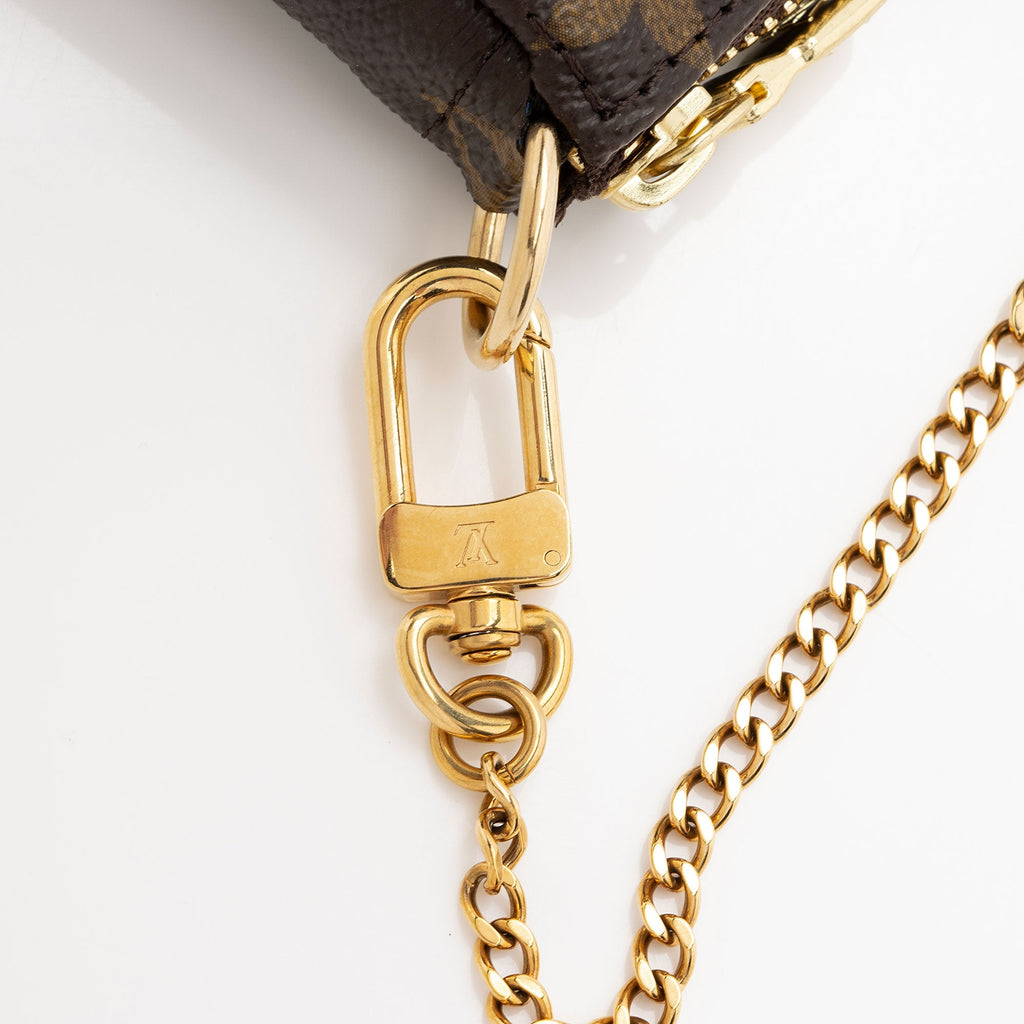 Louis Vuitton Limited Edition Monogram Canvas Vivienne Mini Pochette Accessoires (SHF-fOwdXI)