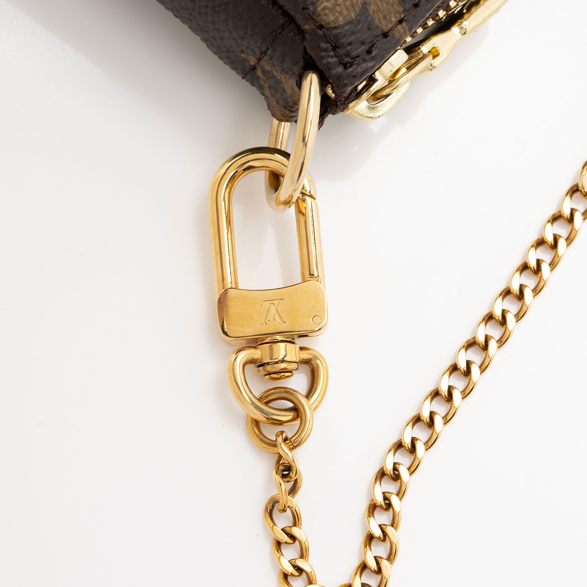 Louis Vuitton Limited Edition Monogram Canvas Vivienne Mini Pochette Accessoires (SHF-fOwdXI)