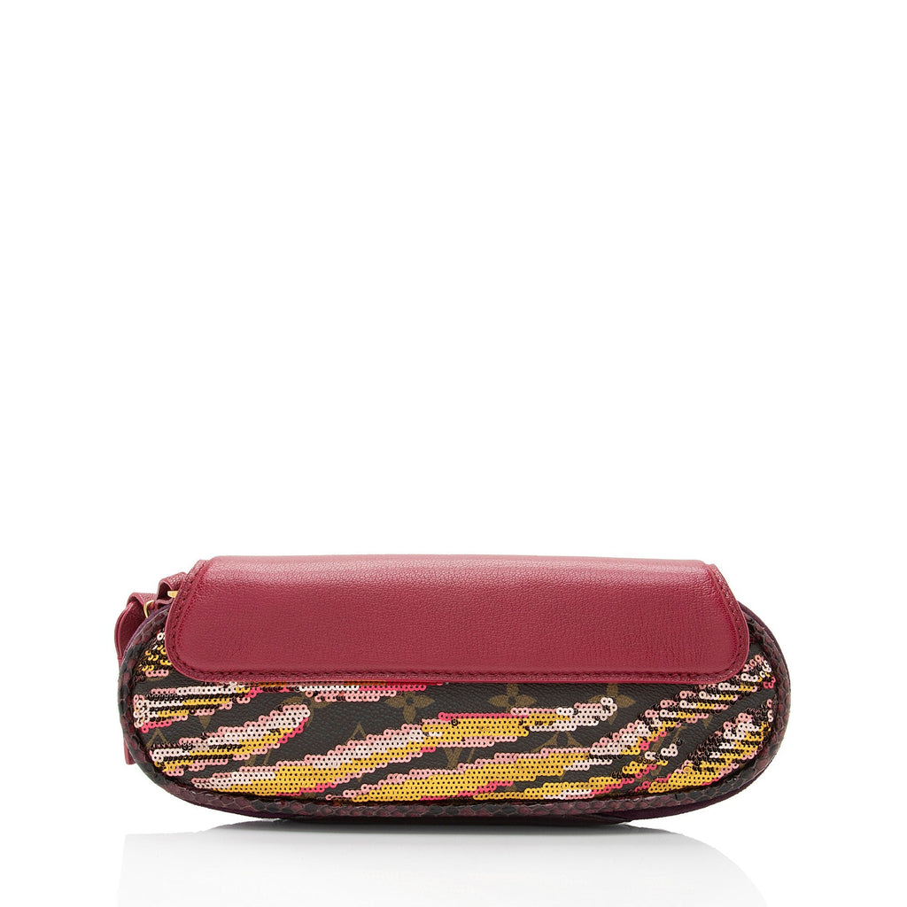 Louis Vuitton Limited Edition Monogram Savage Cub Clutch