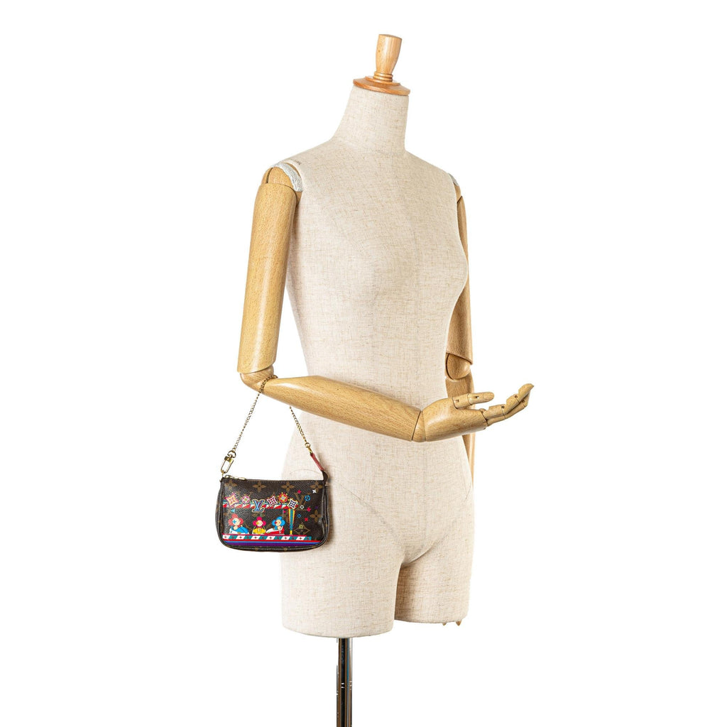 Louis Vuitton Mini Monogram Vivienne Christmas Pochette Accessoires (SHG-Vl6wam)