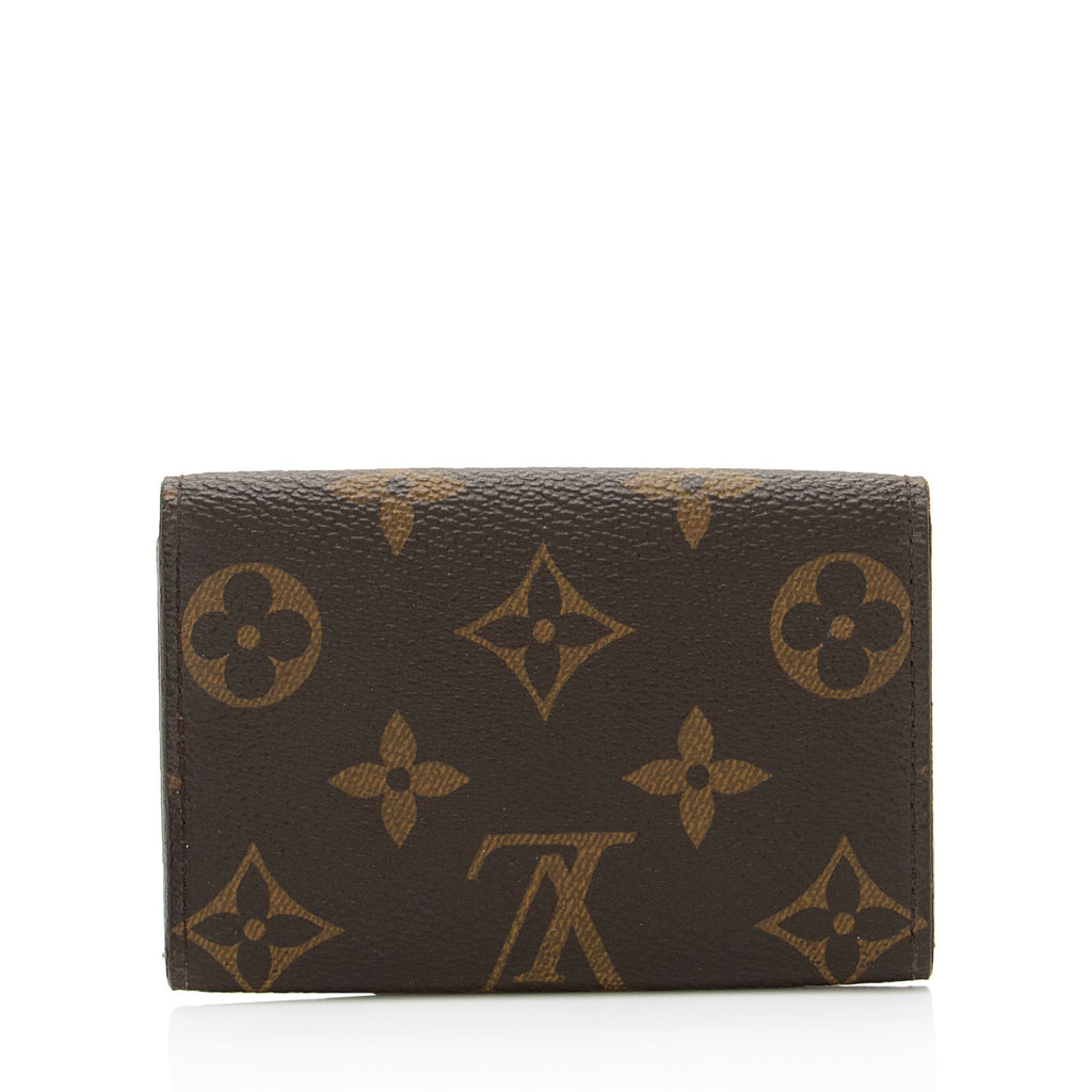 Louis Vuitton Monogram Canvas 6 Key Holder (SHF-WUH2uS)