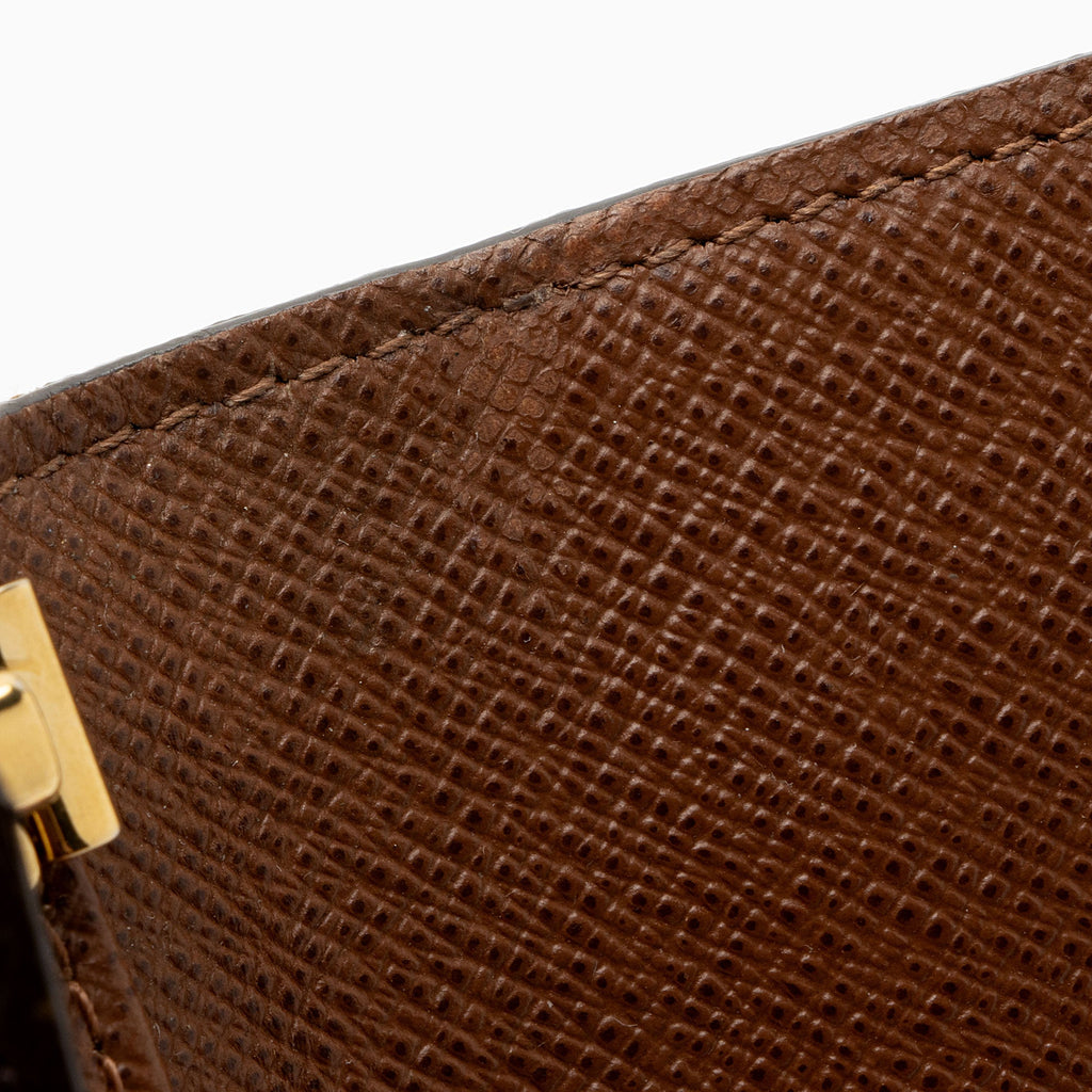 Louis Vuitton Monogram Canvas 6 Key Holder (SHF-WUH2uS)