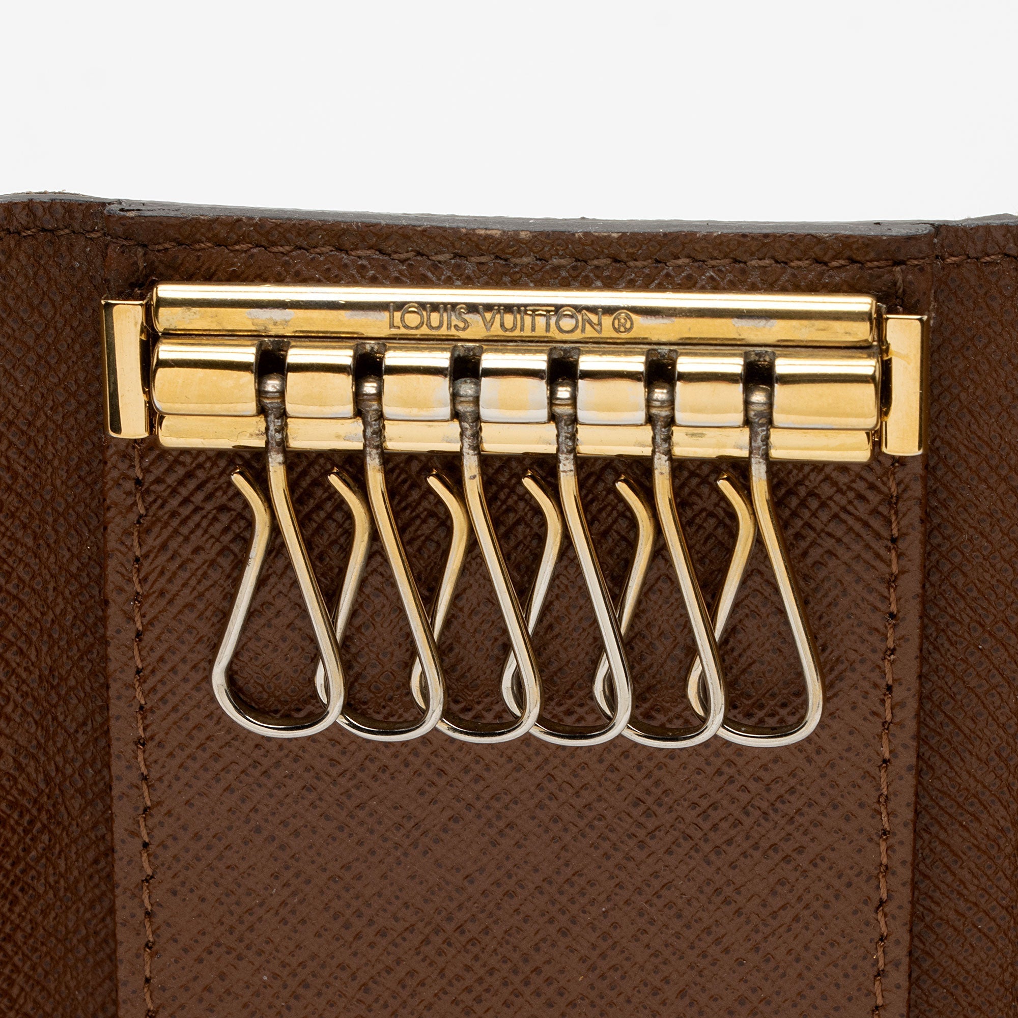 Louis Vuitton Monogram Canvas 6 Key Holder (SHF-WUH2uS)