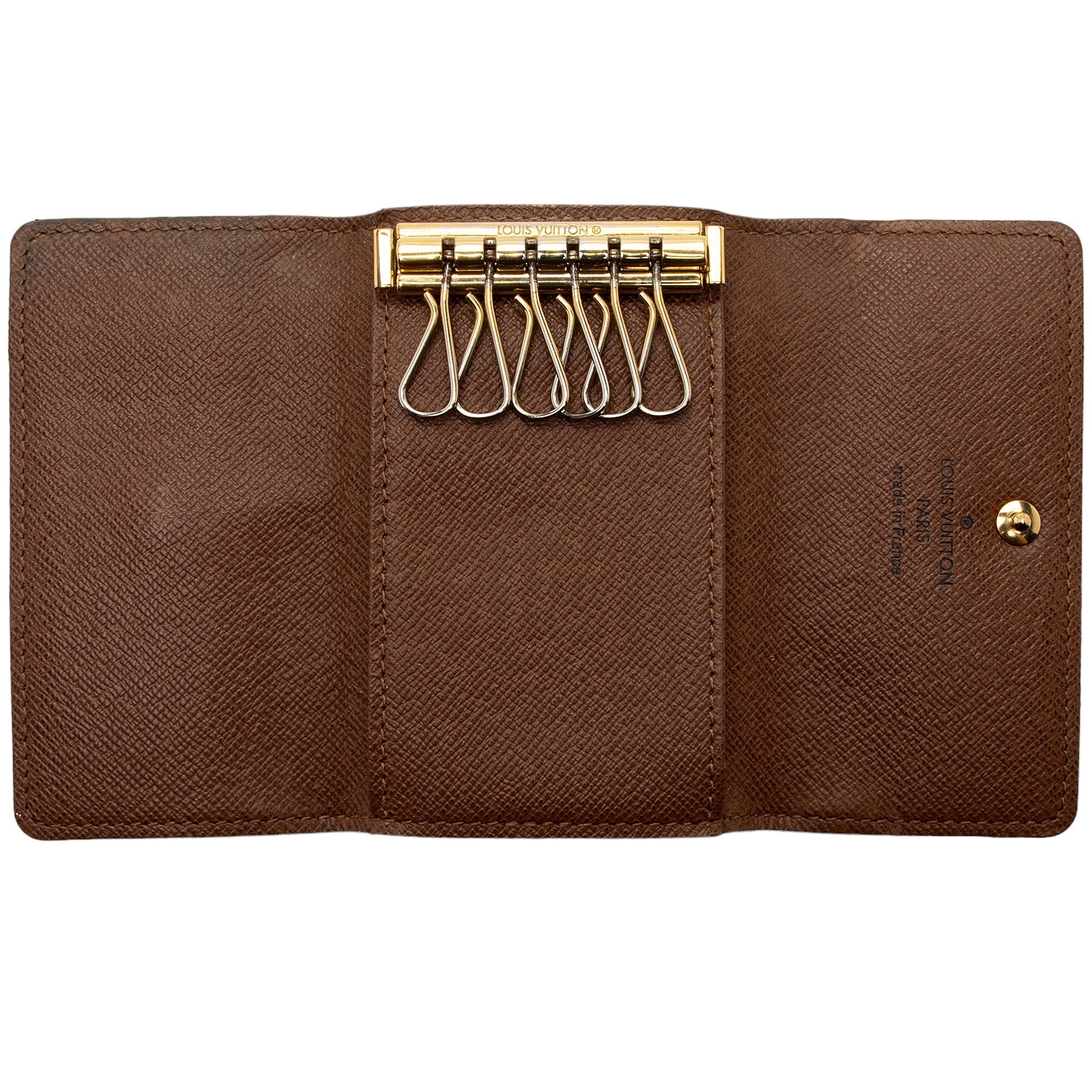 Louis Vuitton Monogram Canvas 6 Key Holder (SHF-WUH2uS)