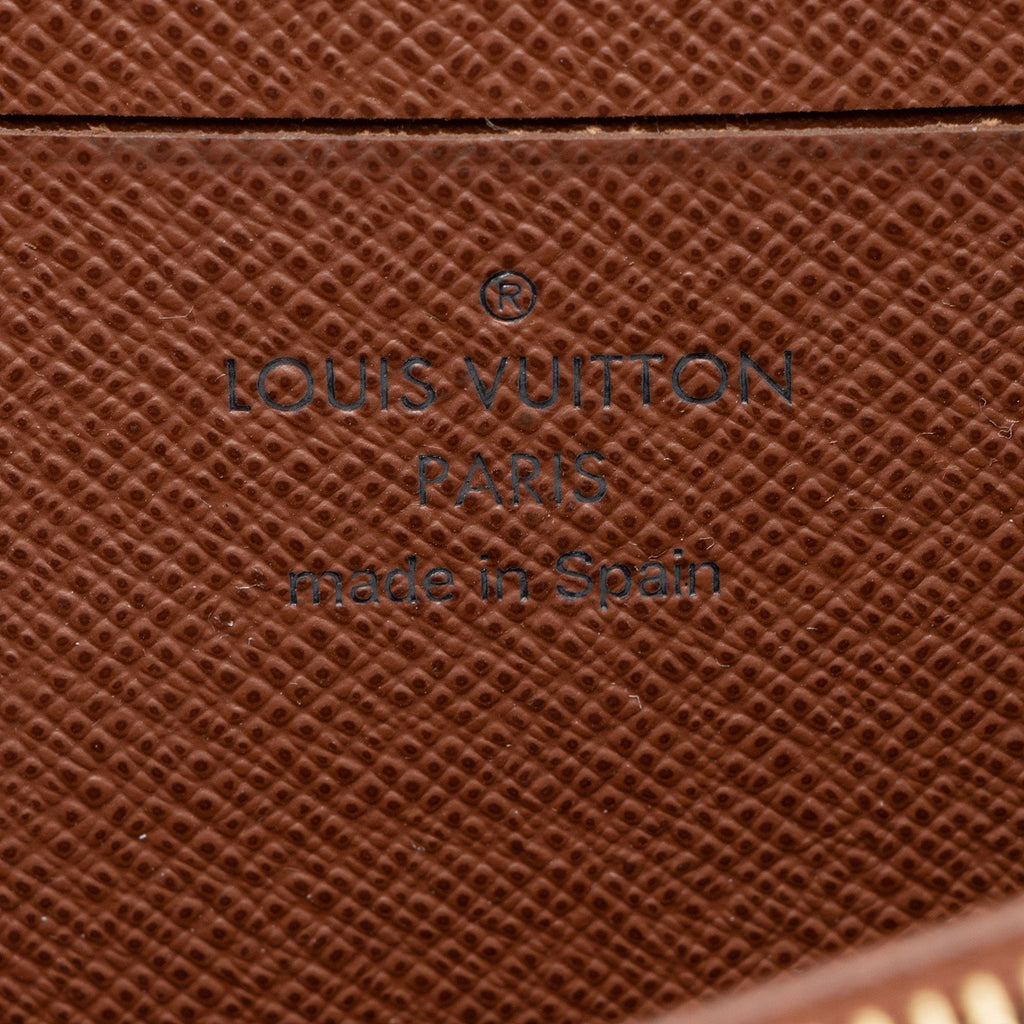 Louis Vuitton Monogram Canvas Compact Zippy Wallet (SHF-7RhWww)