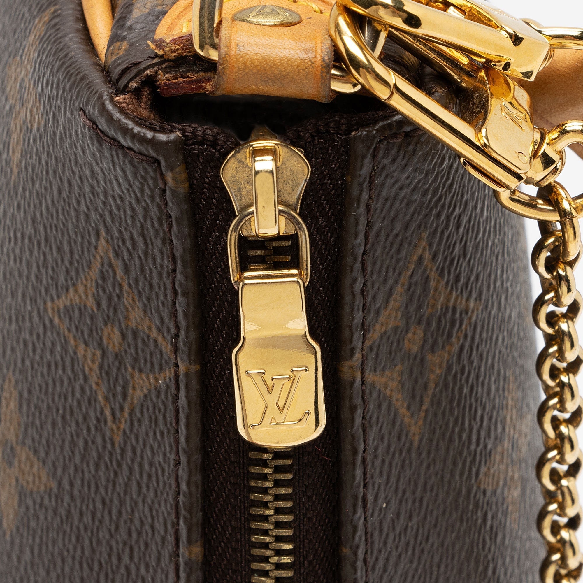 Louis Vuitton Monogram Canvas Eva Clutch (SHF-AbJ6dZ)