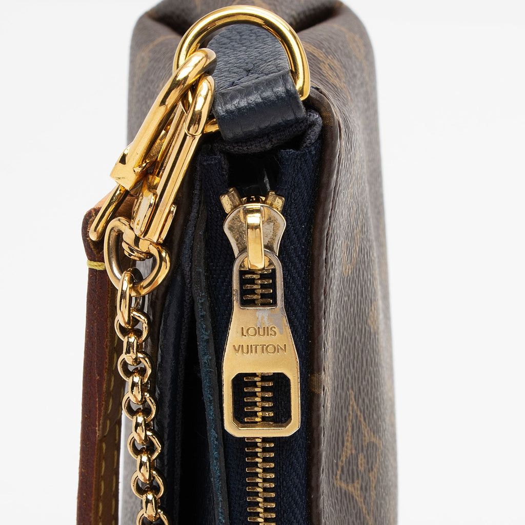 Louis Vuitton Monogram Canvas Pallas Clutch (SHF-DyETKt)