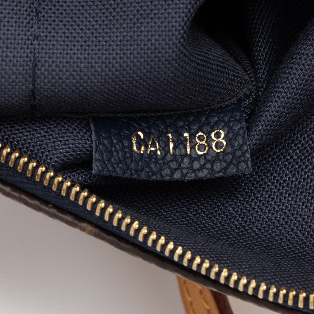 Louis Vuitton Monogram Canvas Pallas Clutch (SHF-DyETKt)