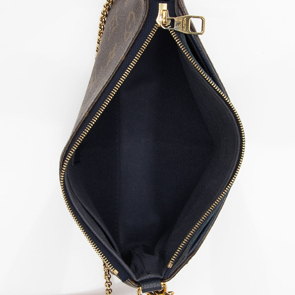 Louis Vuitton Monogram Canvas Pallas Clutch (SHF-DyETKt)