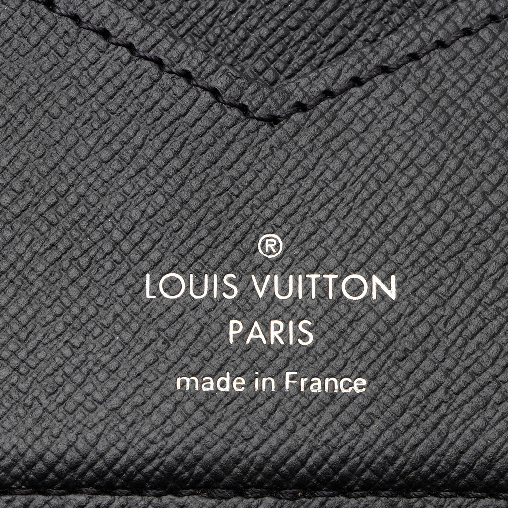 Louis Vuitton Monogram Canvas Pince Wallet (SHF-l7KBfn)