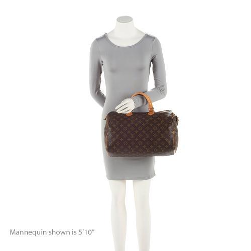 Louis Vuitton  Monogram Canvas Speedy 35 Satchel (SHF-iS1dlK)